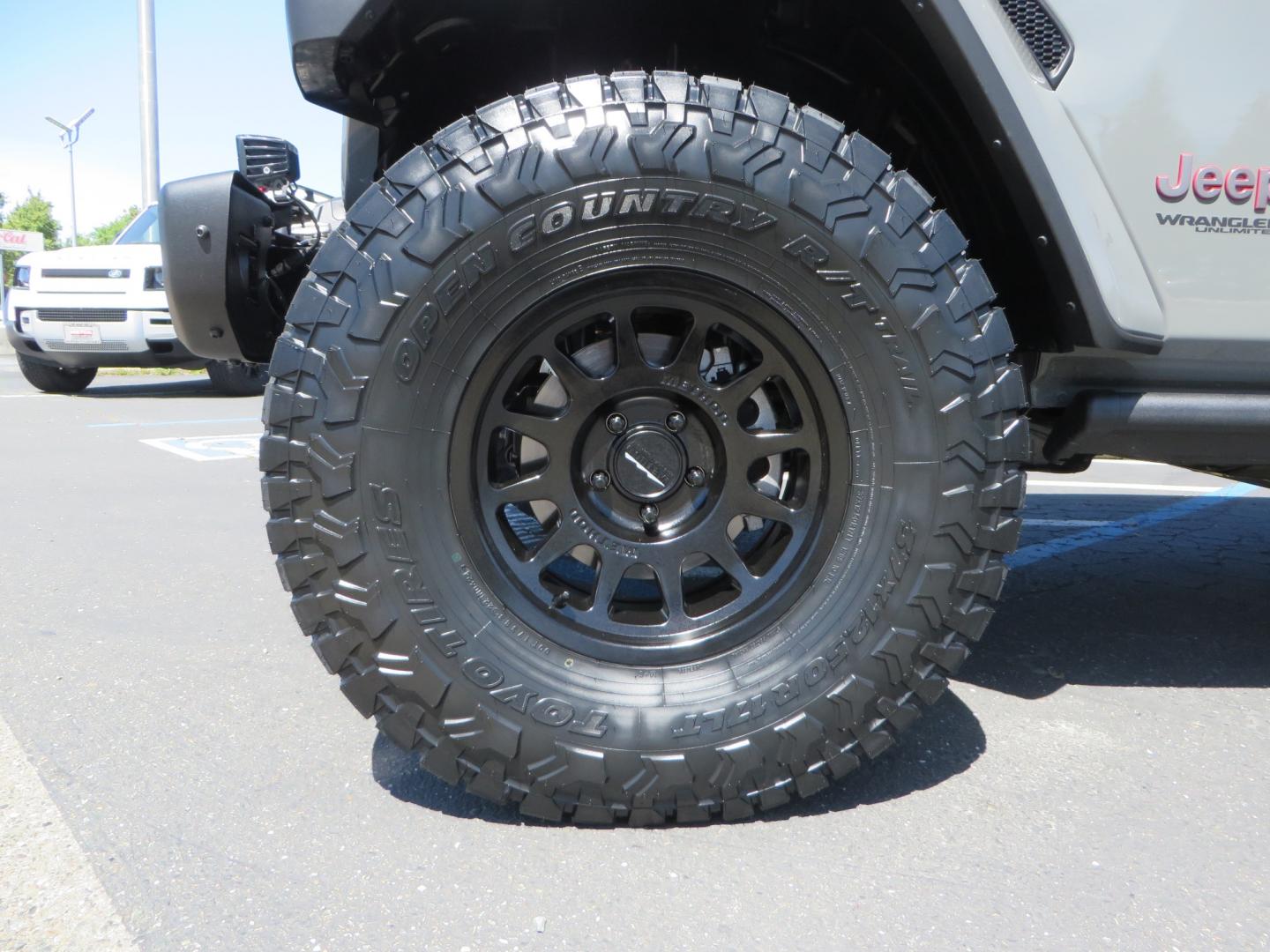 2021 Sting Grey /BLACK Jeep Wrangler Unlimited Rubicon (1C4JJXFM5MW) with an 3.0L V6 DOHC 24V TURBO DIESEL engine, 6A transmission, located at 2630 Grass Valley Highway, Auburn, CA, 95603, (530) 508-5100, 38.937893, -121.095482 - Diesel JL with Sky One power top featuring a Teraflex suspension system, Falcon adjustable shocks & steering stabilizer, Full Metal Cloak skid plate, 17" Method bead grip wheels, 37" Toyo RT Trail tires, Warn winch, Rigid Led lighting, Teraflex HD spare tire carrier, Teraflex Diff covers, Amp steps, - Photo#8